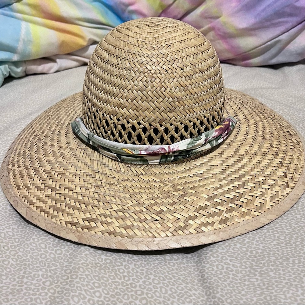 Strand Headware wide rim straw hat with floral tie. Perfect for beach or cruise.